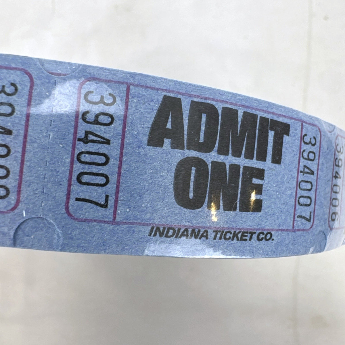 Factory sealed roll of 2000 blue Amscan Admit One paper tickets made in the USA.