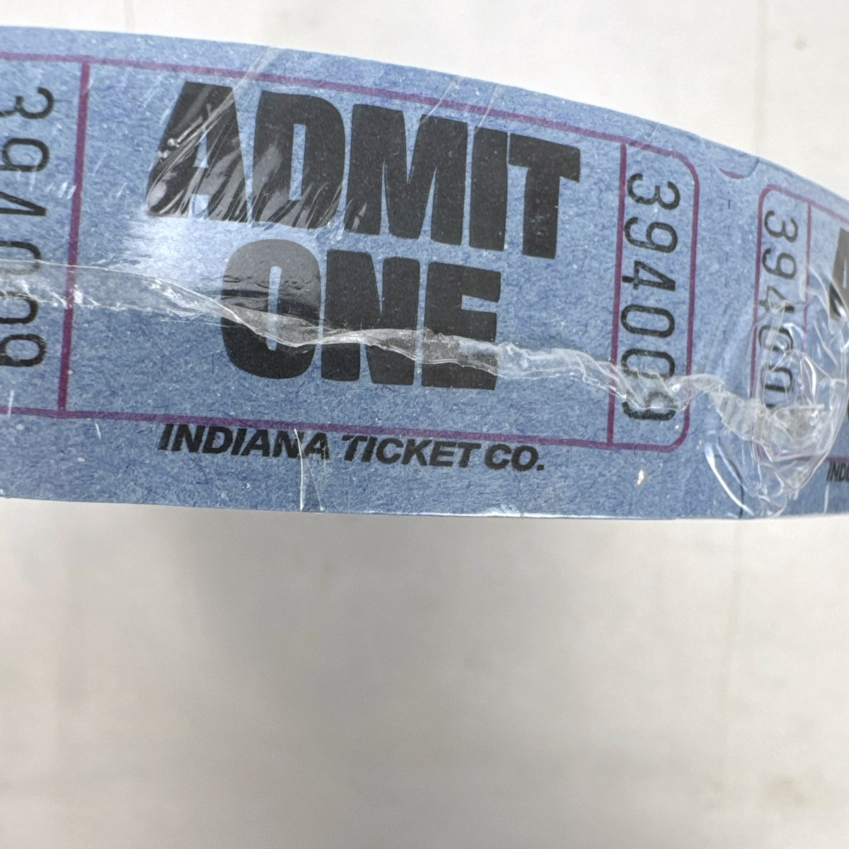 Factory sealed roll of 2000 blue Amscan Admit One paper tickets made in the USA.