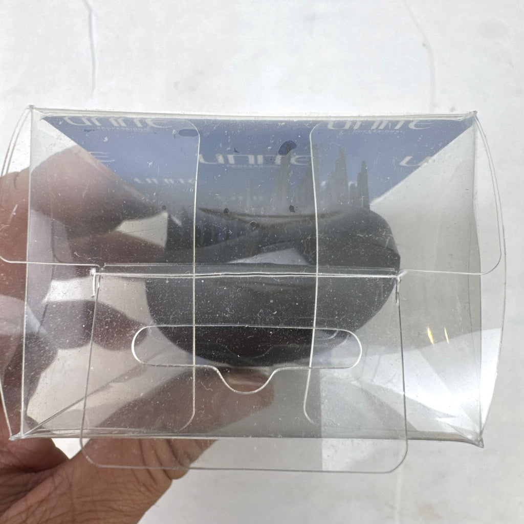 UNITE Pro-System black ergonomic palm detangler hairbrush in original clear box