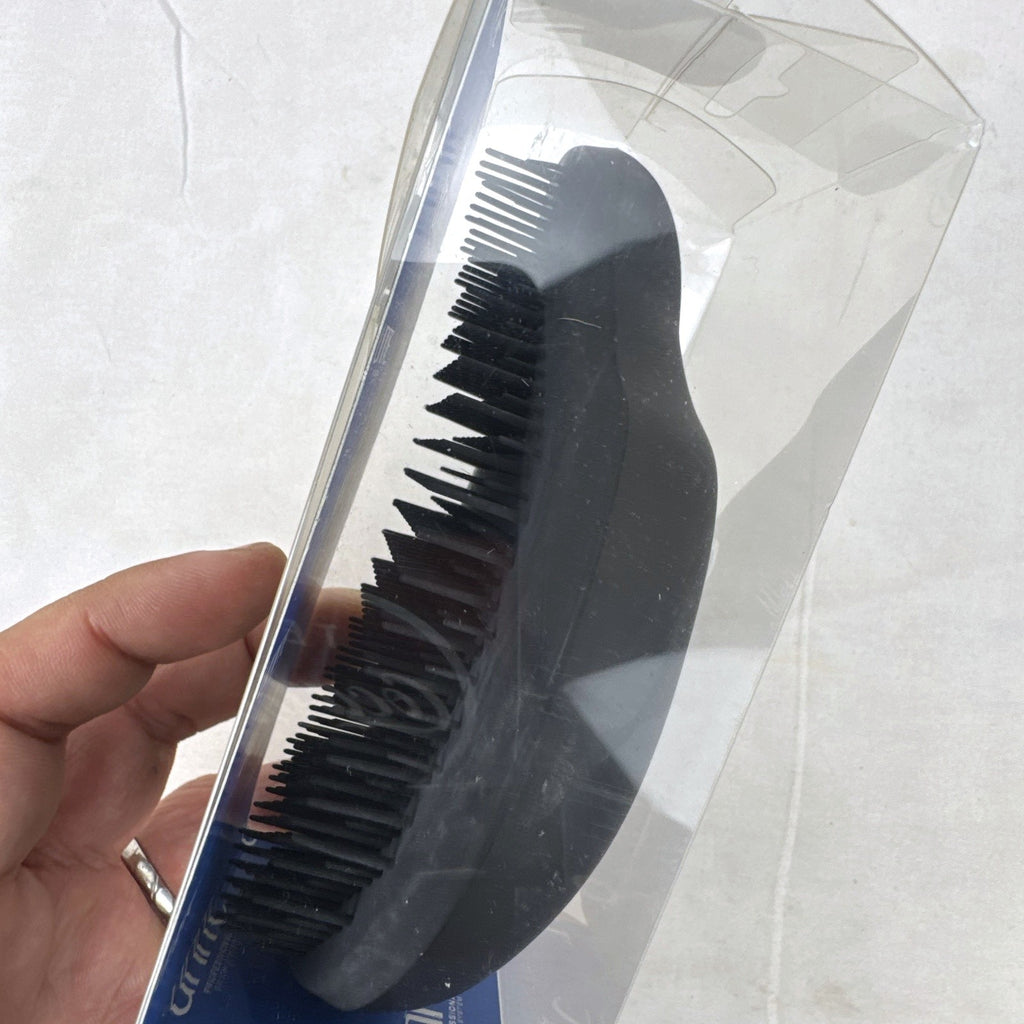 UNITE Pro-System black ergonomic palm detangler hairbrush in original clear box