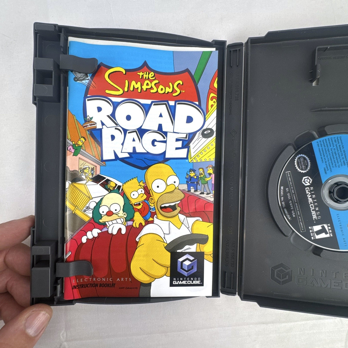 The Simpsons Road Rage video game disc and original case for Nintendo GameCube.