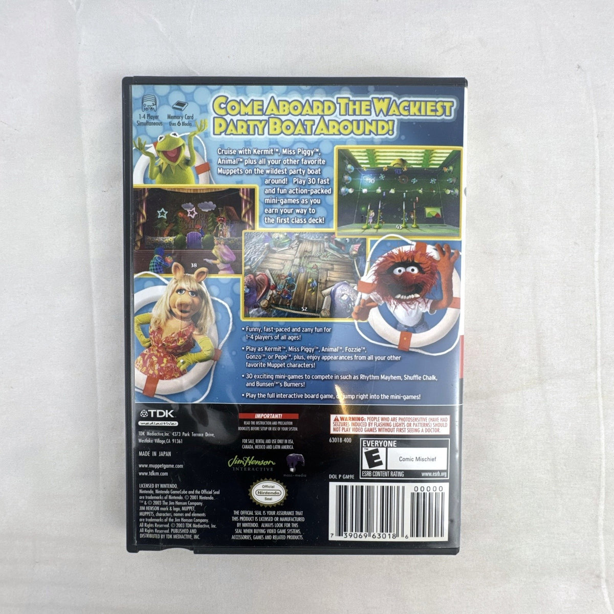 Jim Henson's Muppets Party Cruise game disc and case for Nintendo GameCube.