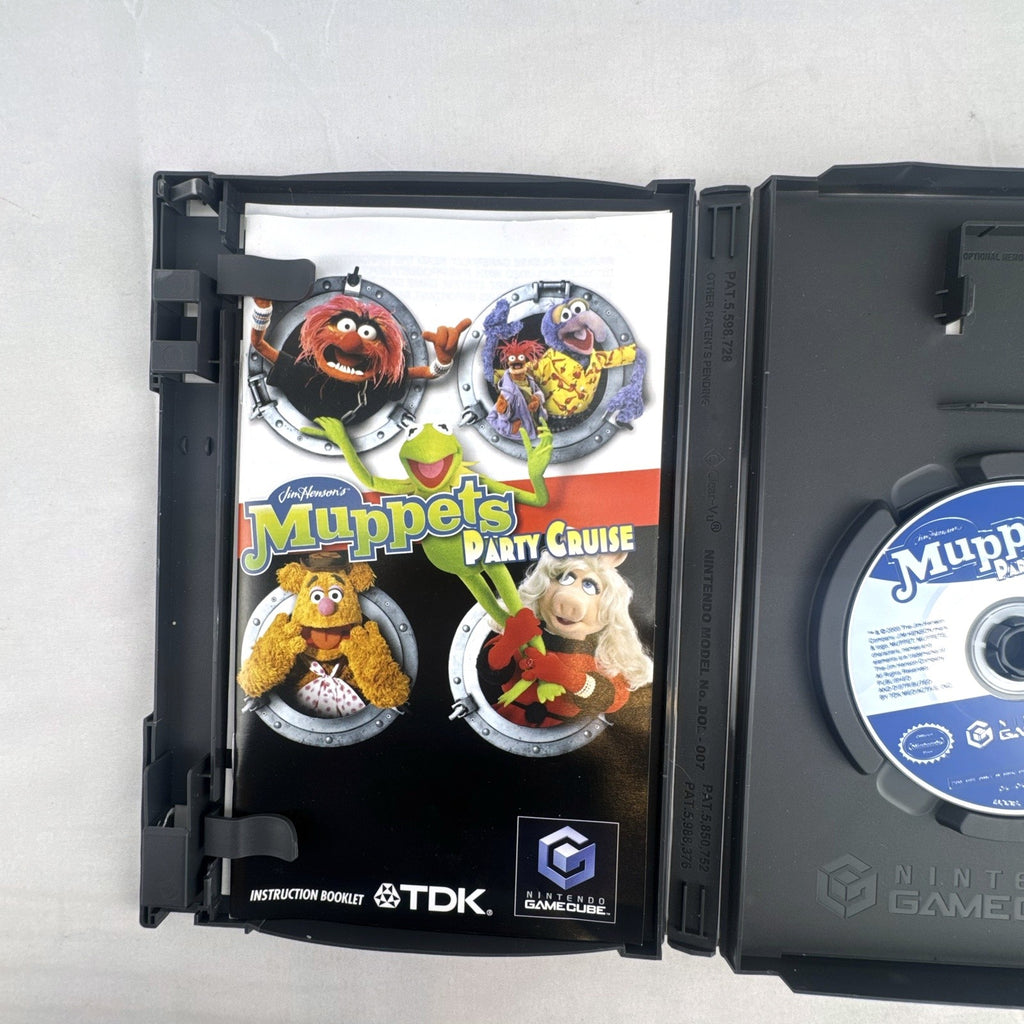 Jim Henson's Muppets Party Cruise game disc and case for Nintendo GameCube.