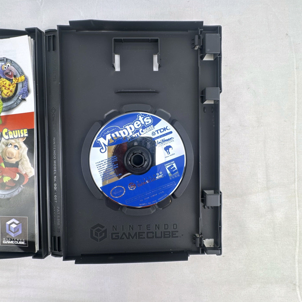 Jim Henson's Muppets Party Cruise game disc and case for Nintendo GameCube.
