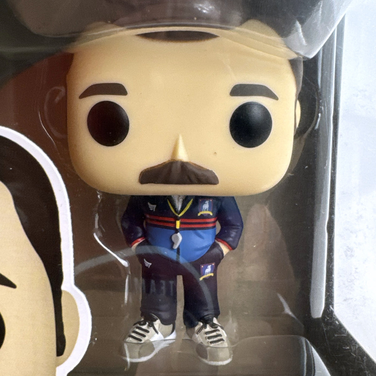 Funko Pop! Television Ted Lasso #1351 vinyl figure in navy blue tracksuit in original box