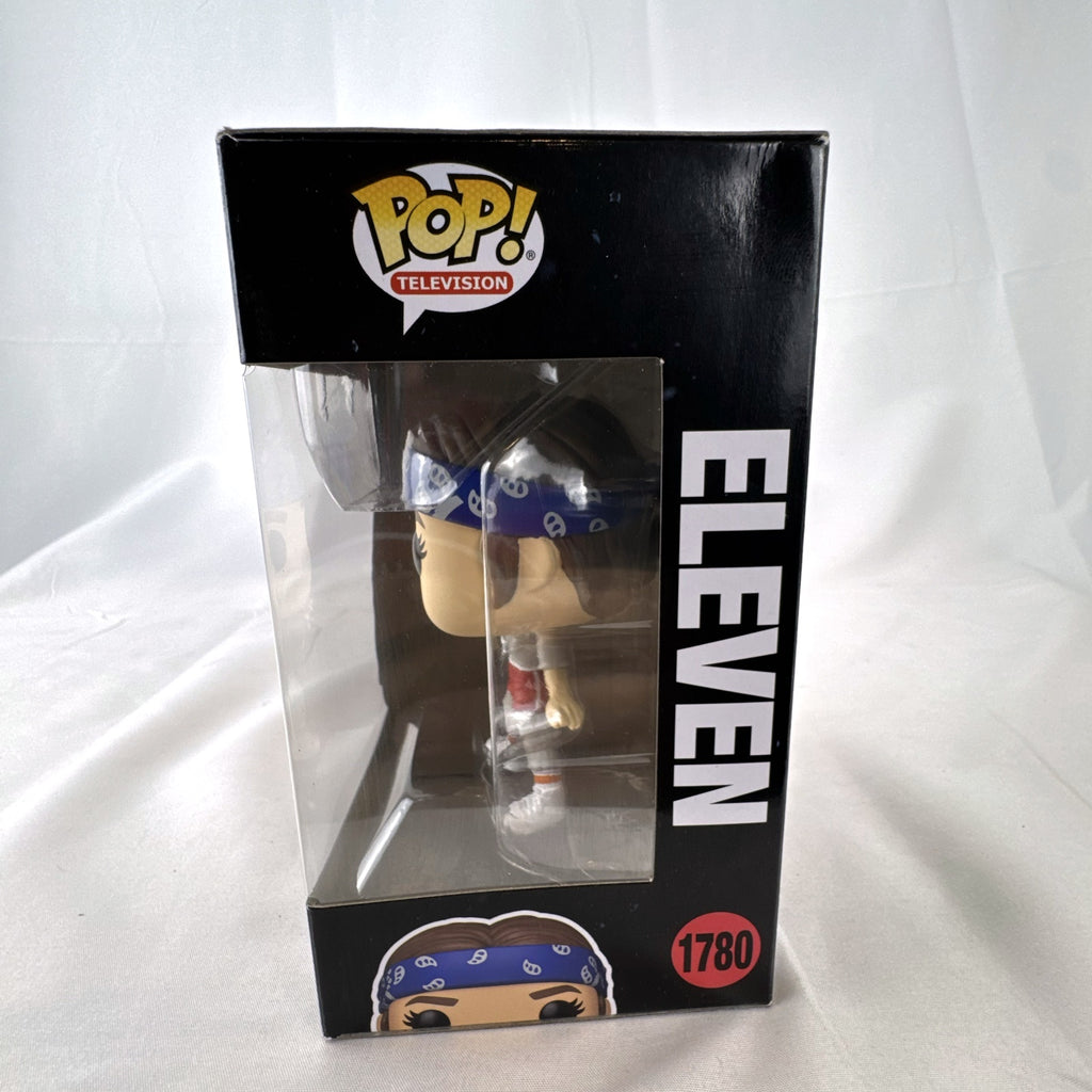Funko Pop Stranger Things Eleven #1780 vinyl figure in original packaging featuring her blue paisley bandana training outfit