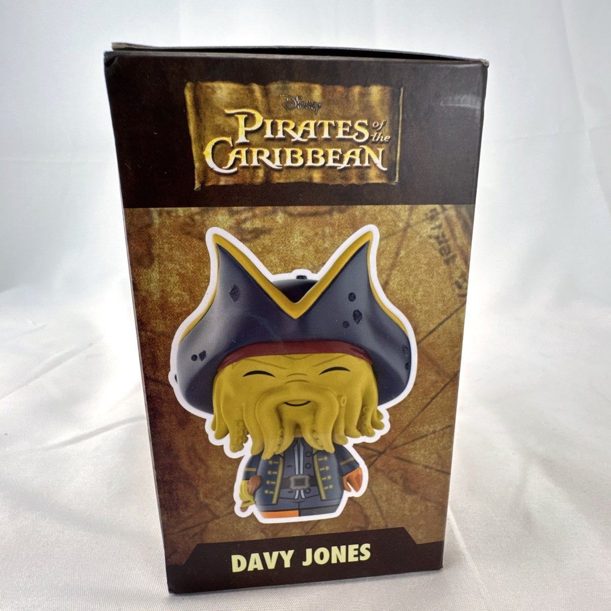 Funko Dorbz Davy Jones vinyl figure number 203 from Disney Pirates of the Caribbean in original worn box.