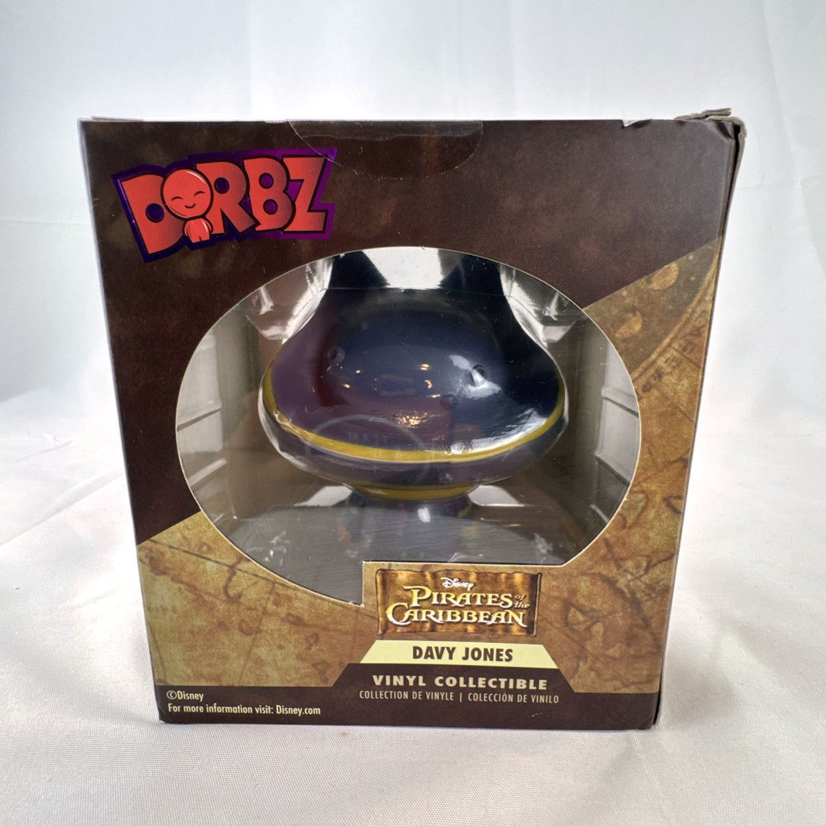 Funko Dorbz Davy Jones vinyl figure number 203 from Disney Pirates of the Caribbean in original worn box.