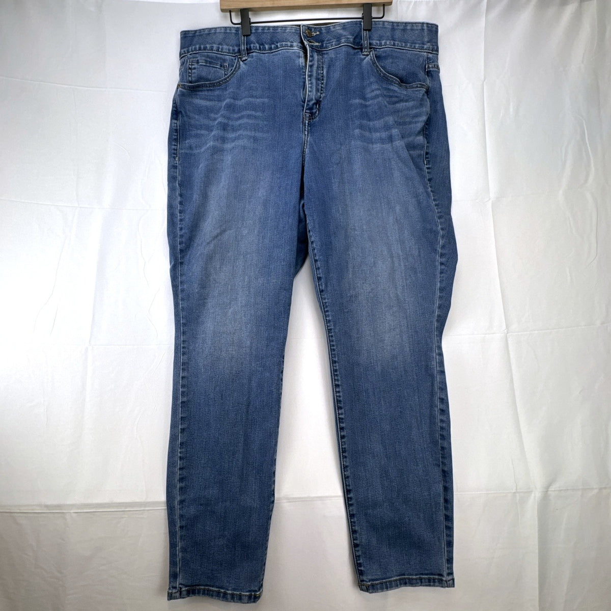 Lane Bryant women's plus size 22 medium wash stretch skinny ankle jeans with embroidered back pockets.