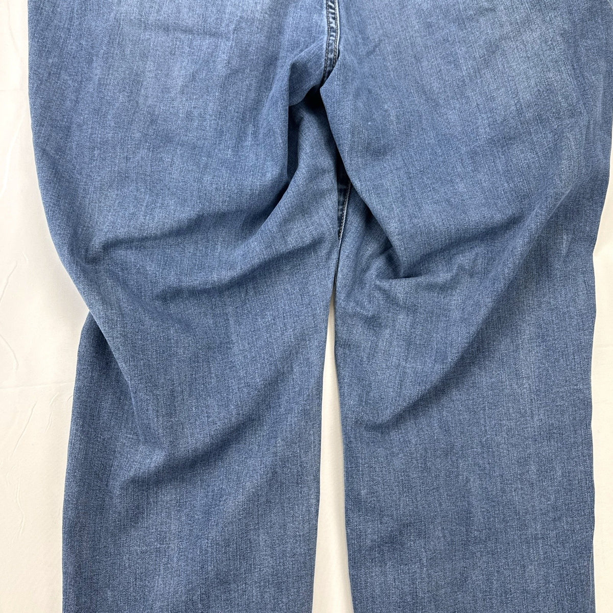 Lane Bryant women's plus size 22 medium wash stretch skinny ankle jeans with embroidered back pockets.