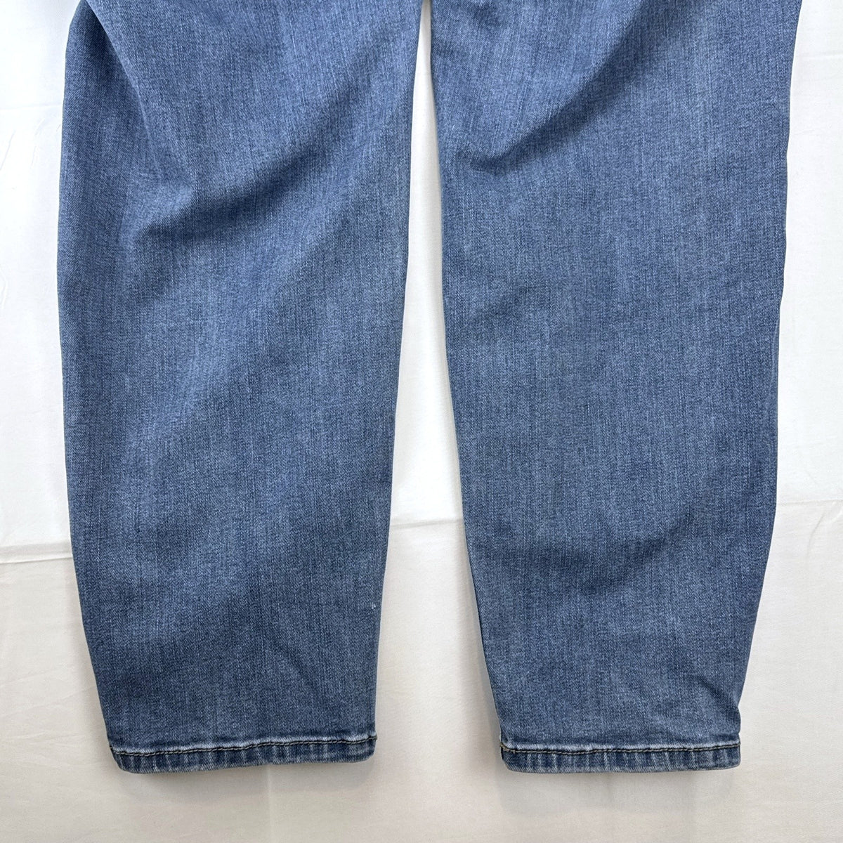 Lane Bryant women's plus size 22 medium wash stretch skinny ankle jeans with embroidered back pockets.