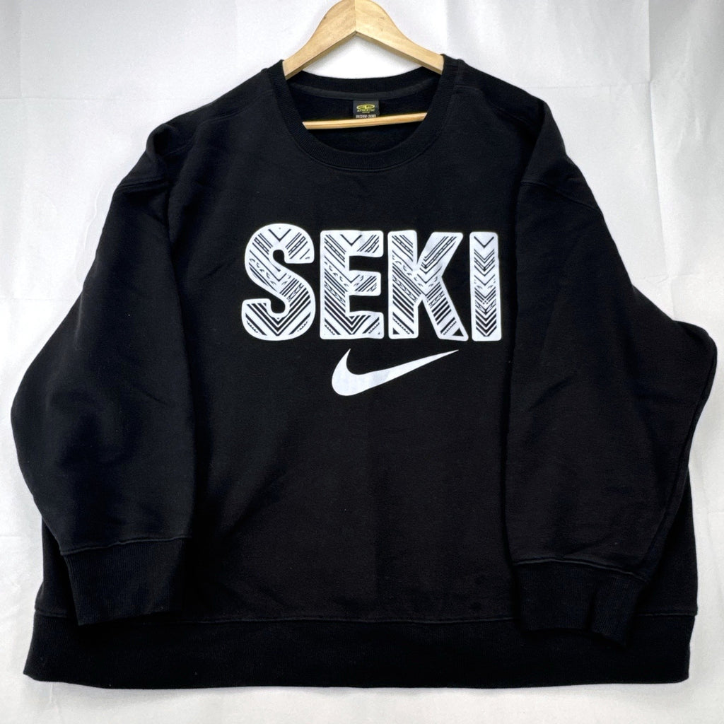Women's plus size 3X Athletic Works black crewneck fleece sweatshirt with SEKI graphic print.
