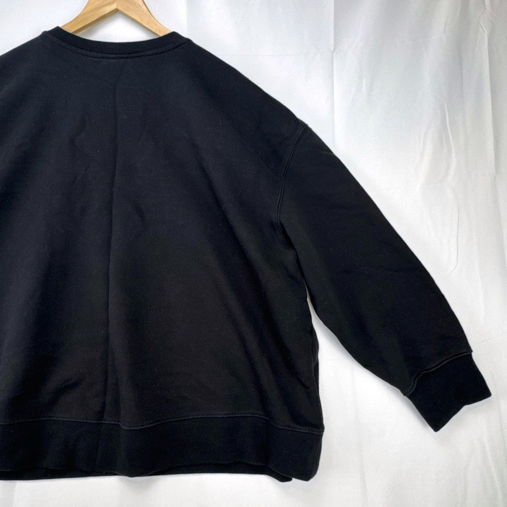 Women's plus size 3X Athletic Works black crewneck fleece sweatshirt with SEKI graphic print.