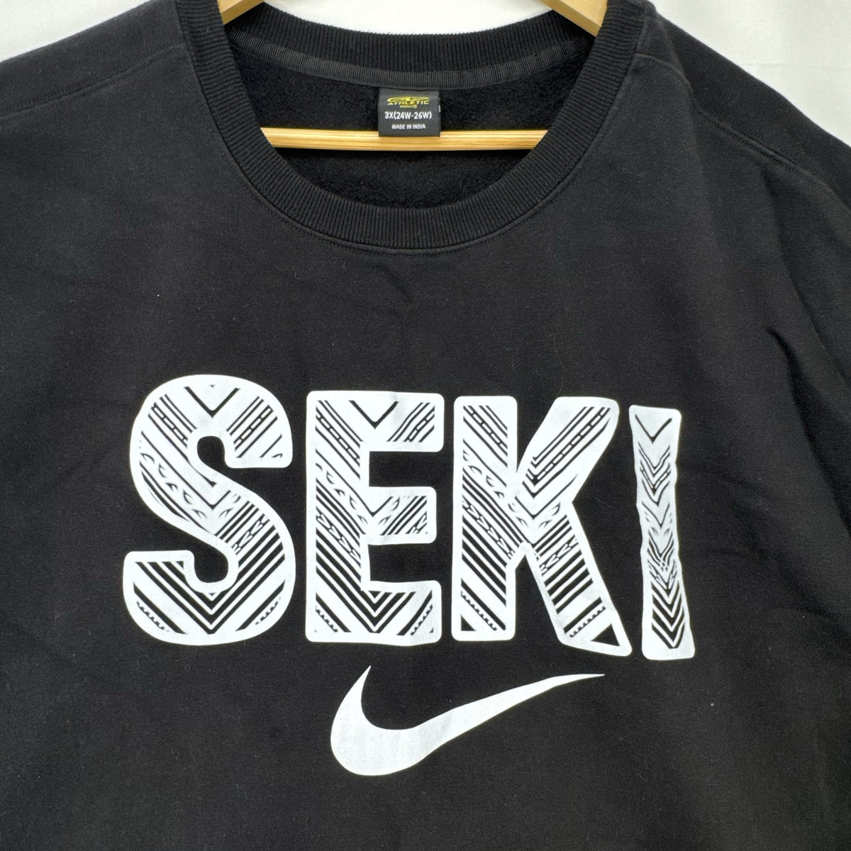 Women's plus size 3X Athletic Works black crewneck fleece sweatshirt with SEKI graphic print.