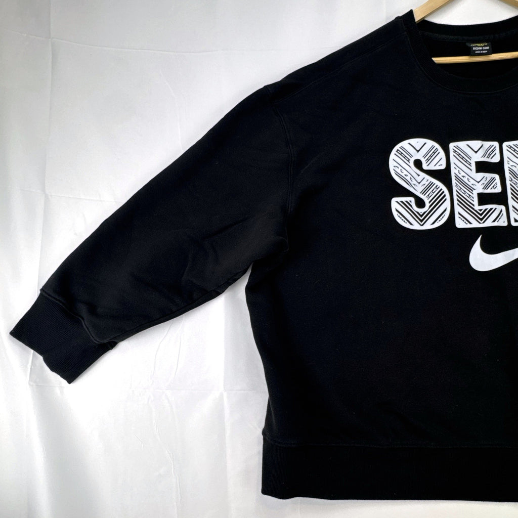 Women's plus size 3X Athletic Works black crewneck fleece sweatshirt with SEKI graphic print.