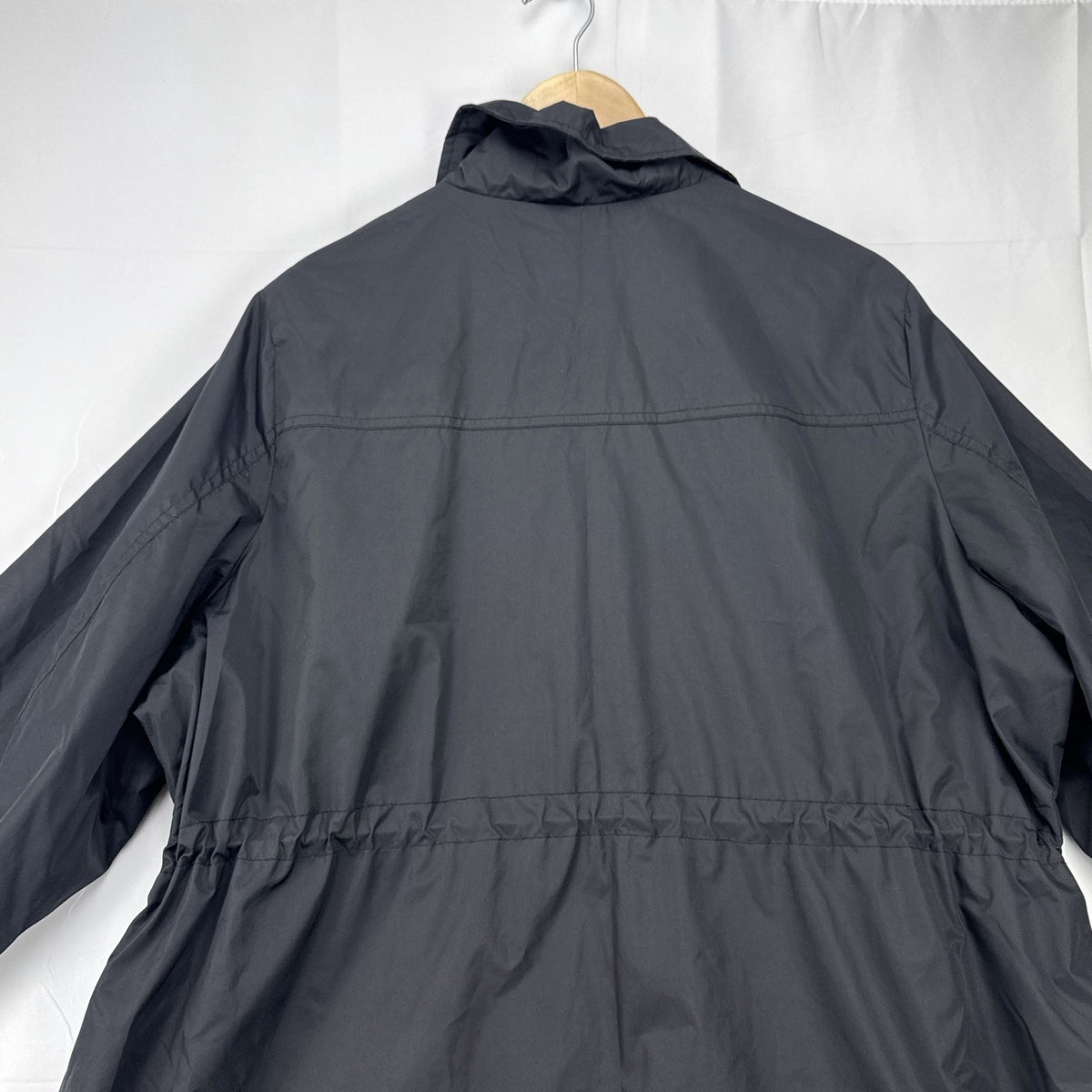 Lane Bryant black ruffle trim cinch-waist rain jacket in women's plus size 22/24