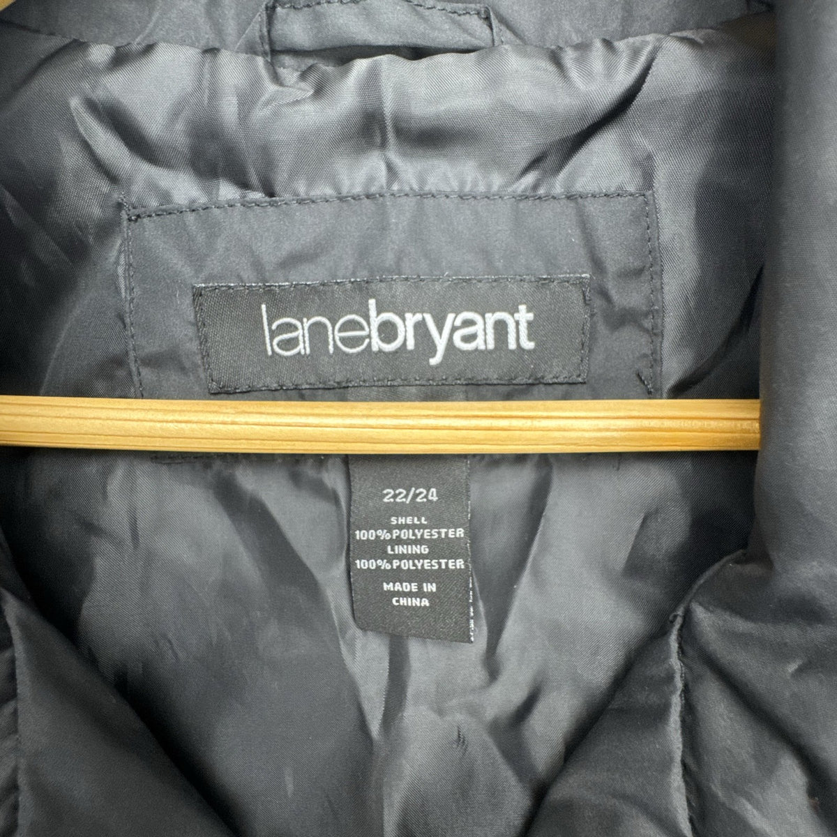 Lane Bryant black ruffle trim cinch-waist rain jacket in women's plus size 22/24