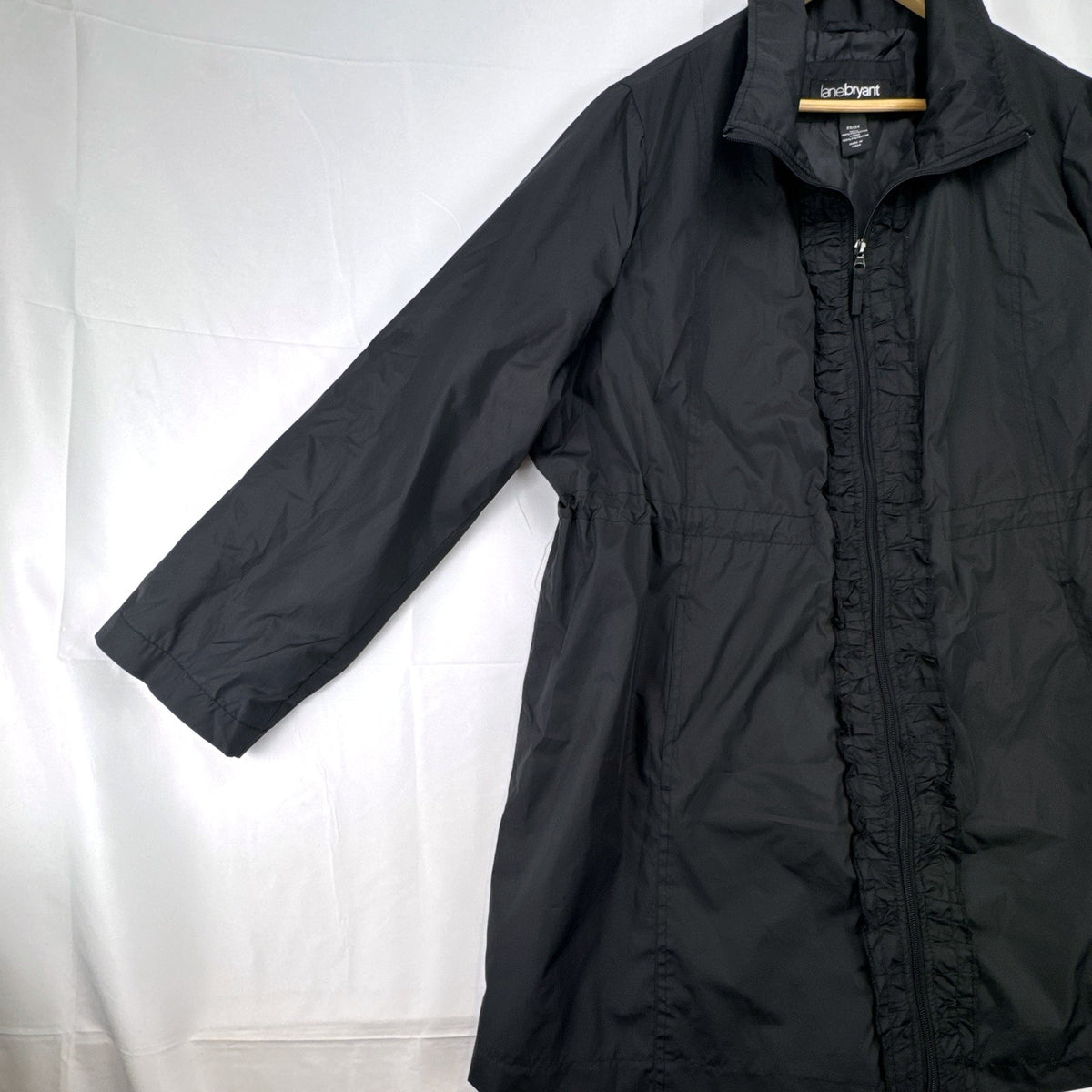 Lane Bryant black ruffle trim cinch-waist rain jacket in women's plus size 22/24