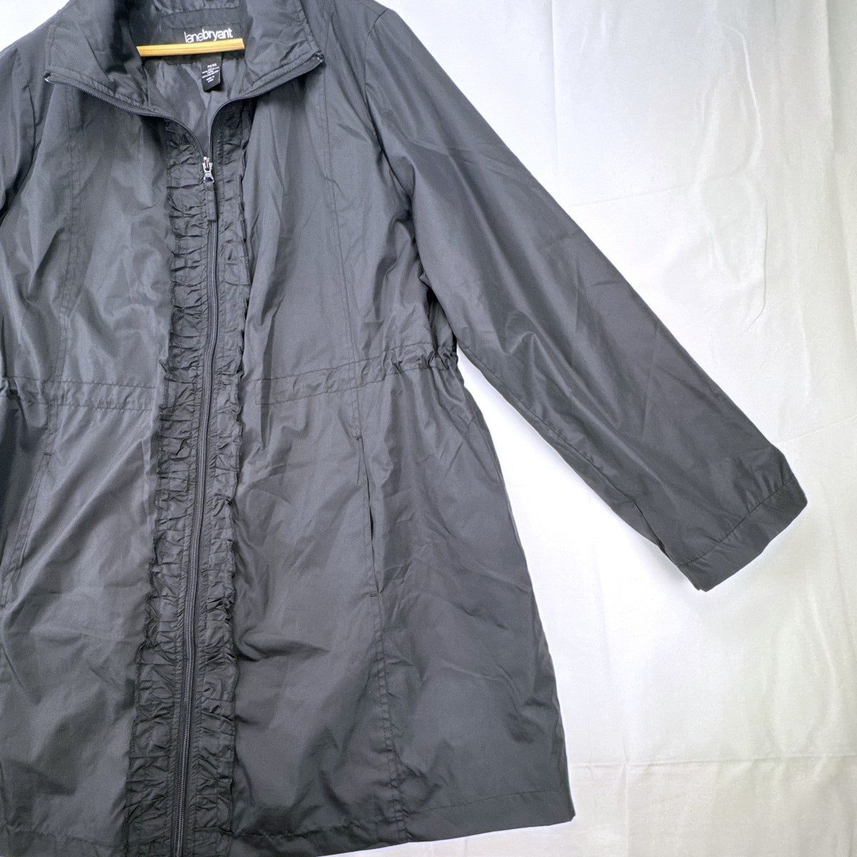 Lane Bryant black ruffle trim cinch-waist rain jacket in women's plus size 22/24