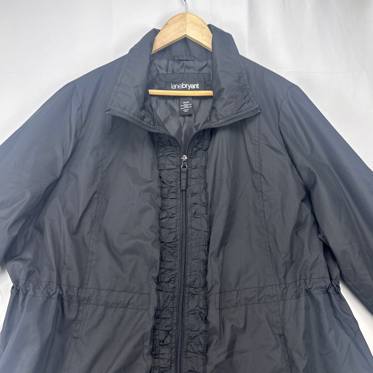 Lane Bryant black ruffle trim cinch-waist rain jacket in women's plus size 22/24