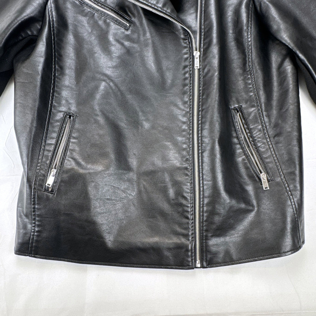 Lane Bryant women's plus size 22/24 black faux leather moto jacket with stretch knit sleeve panels.