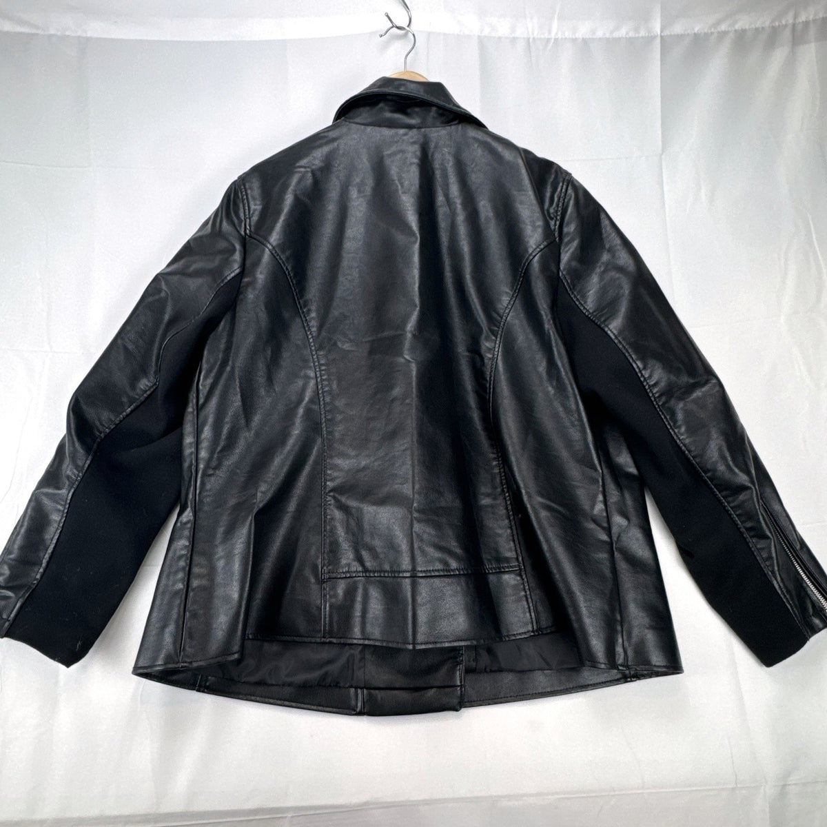 Lane Bryant women's plus size 22/24 black faux leather moto jacket with stretch knit sleeve panels.