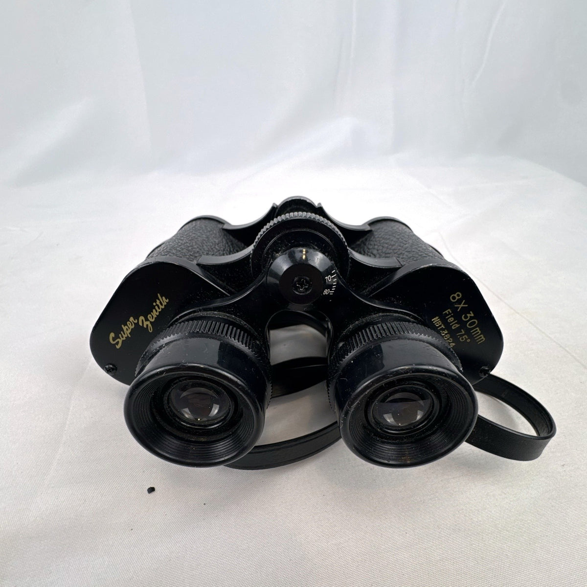 Super Zenith 8x30mm vintage black Porro prism binoculars with neck strap, made in Japan.