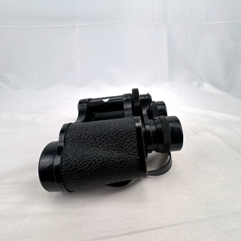 Super Zenith 8x30mm vintage black Porro prism binoculars with neck strap, made in Japan.