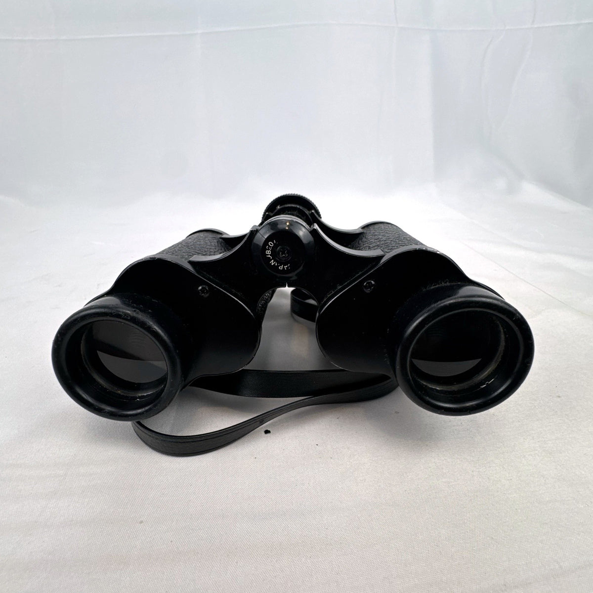 Super Zenith 8x30mm vintage black Porro prism binoculars with neck strap, made in Japan.