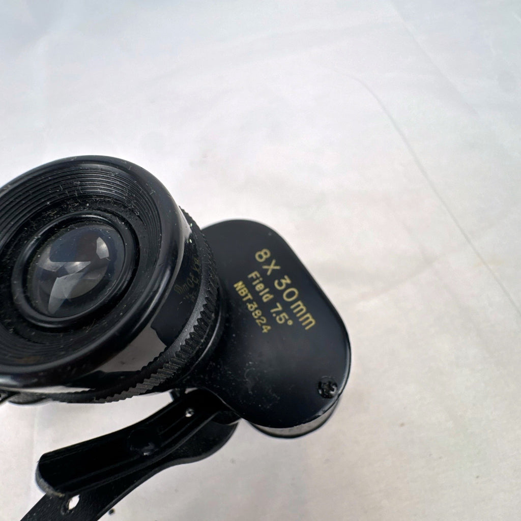 Super Zenith 8x30mm vintage black Porro prism binoculars with neck strap, made in Japan.