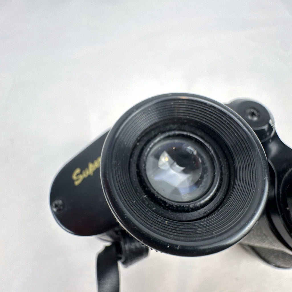 Super Zenith 8x30mm vintage black Porro prism binoculars with neck strap, made in Japan.