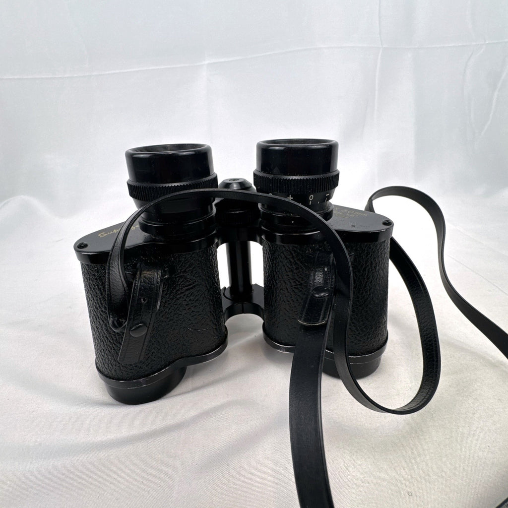 Super Zenith 8x30mm vintage black Porro prism binoculars with neck strap, made in Japan.