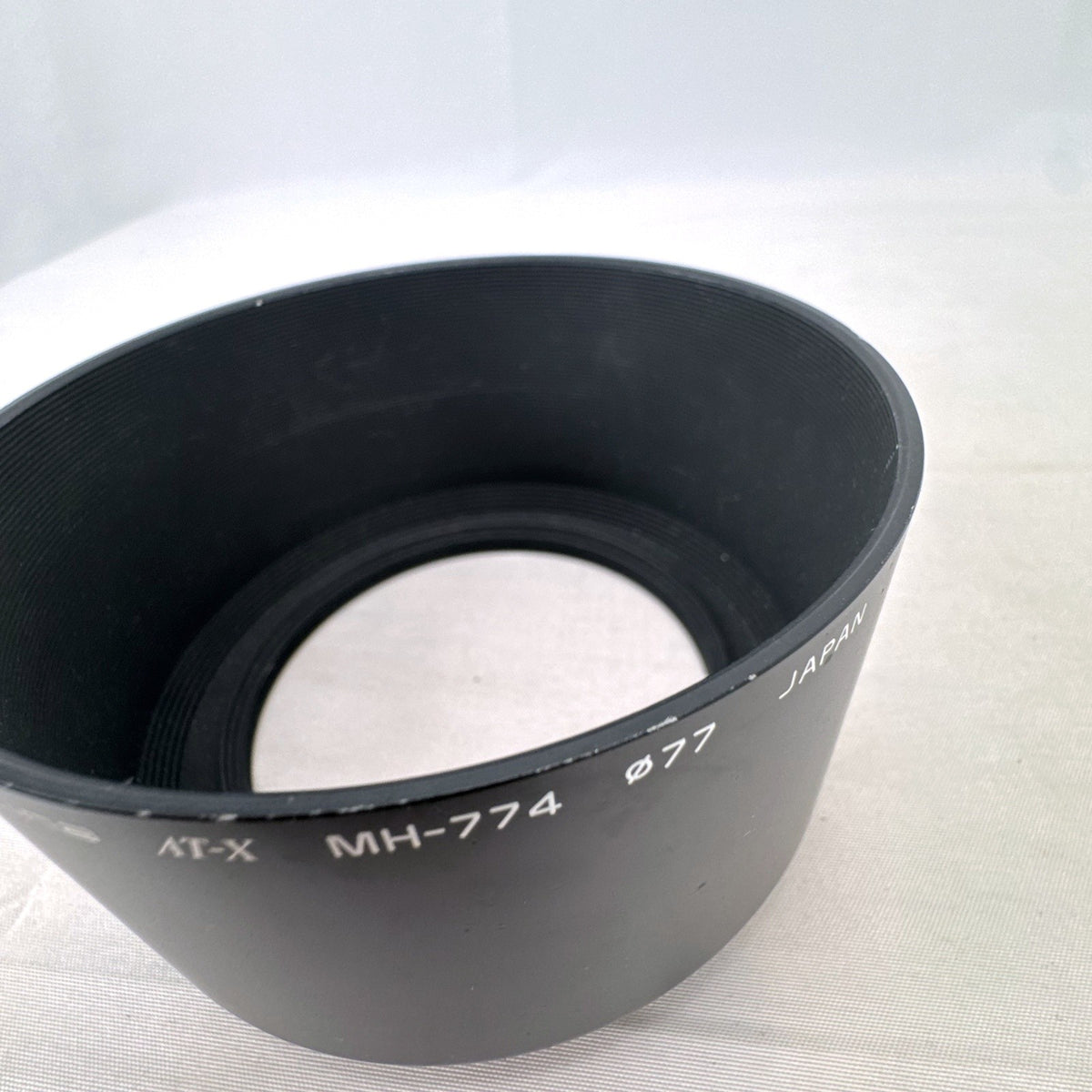 Tokina MH-774 AT-X 77mm round black metal screw-in lens hood made in Japan