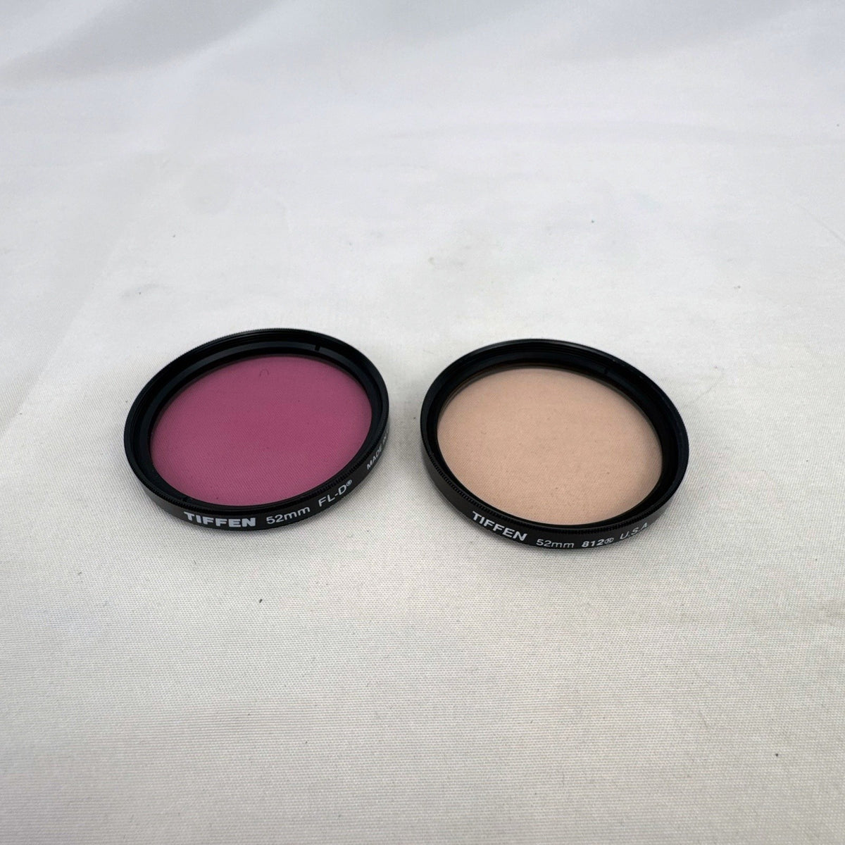 Pair of vintage USA-made Tiffen 52mm FL-D and 812 threaded camera lens filters