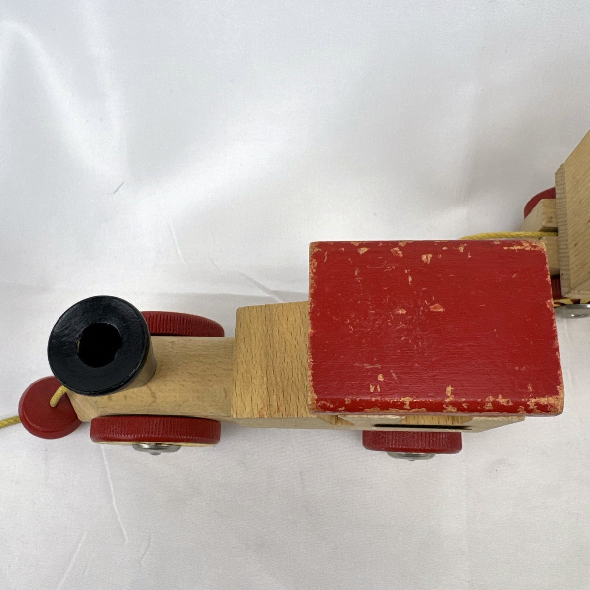 Vintage BRIO Swedish wooden pull toy train with locomotive and three connected wagons