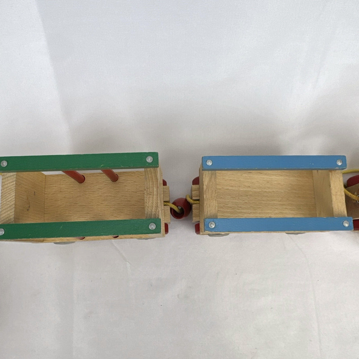 Vintage BRIO Swedish wooden pull toy train with locomotive and three connected wagons