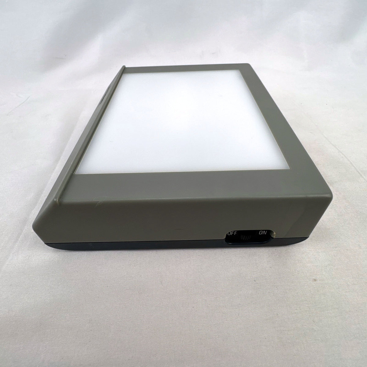 Letraset RotoVision portable gray desktop light box and slide viewer with fold-out stand