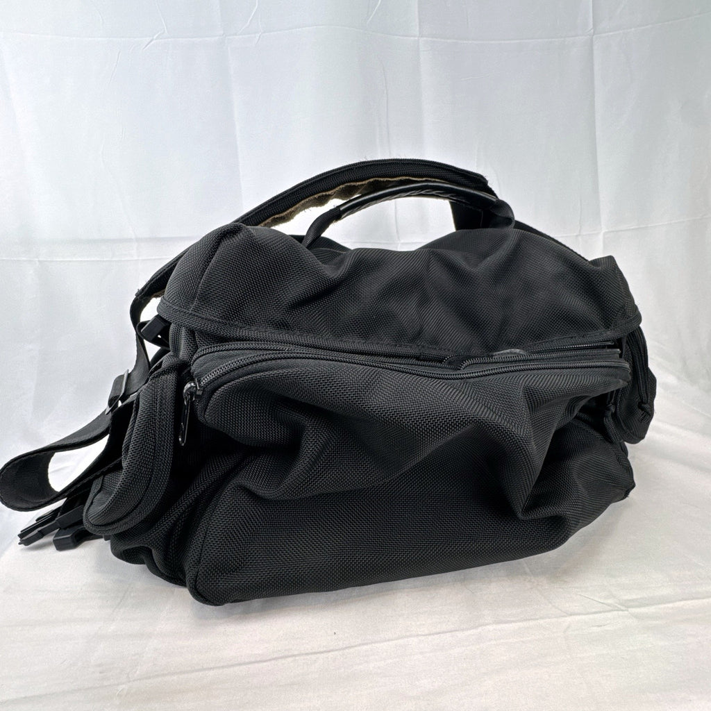 Tamrac black ballistic nylon padded camera shoulder bag with red accent stripe