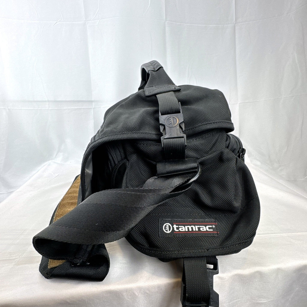 Tamrac black ballistic nylon padded camera shoulder bag with red accent stripe
