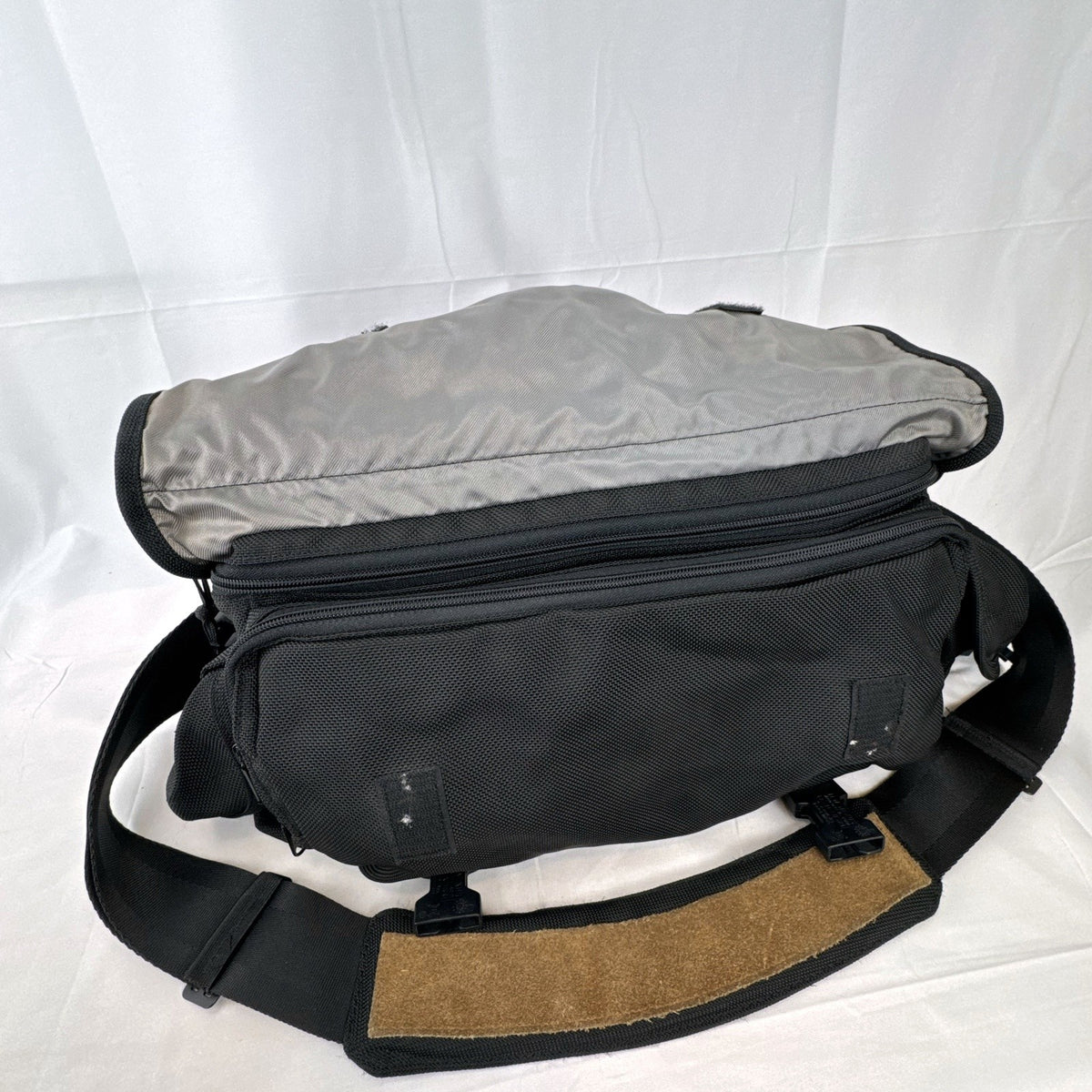 Tamrac black ballistic nylon padded camera shoulder bag with red accent stripe