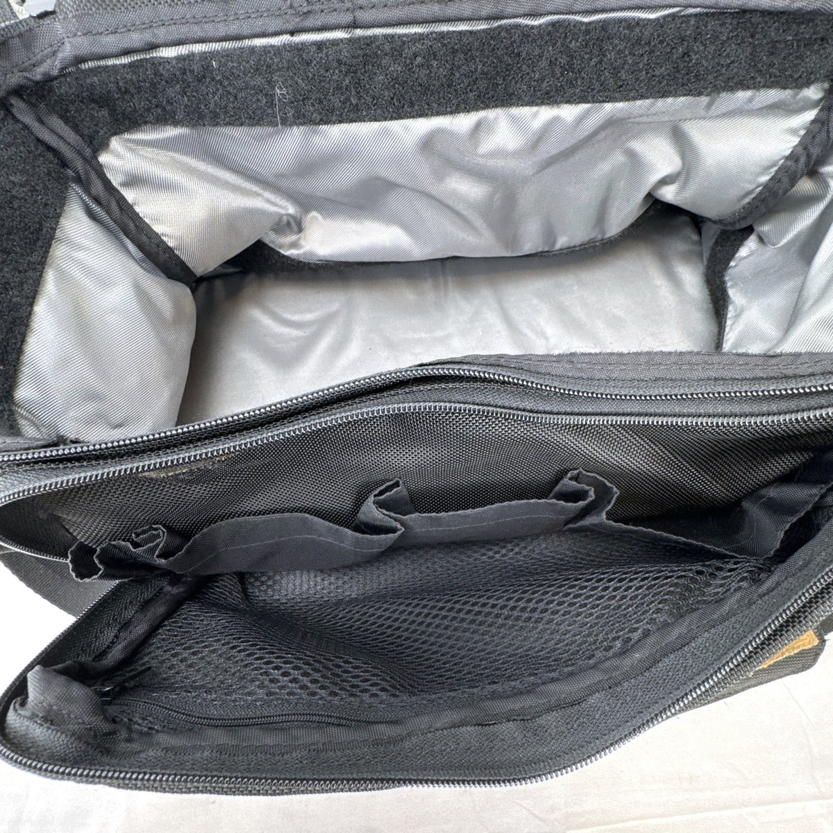 Tamrac black ballistic nylon padded camera shoulder bag with red accent stripe