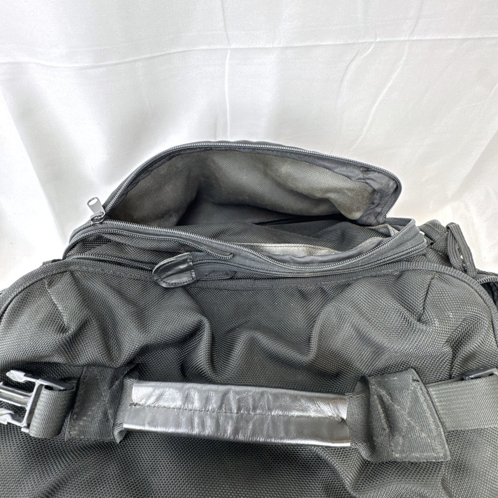 Tamrac black ballistic nylon padded camera shoulder bag with red accent stripe
