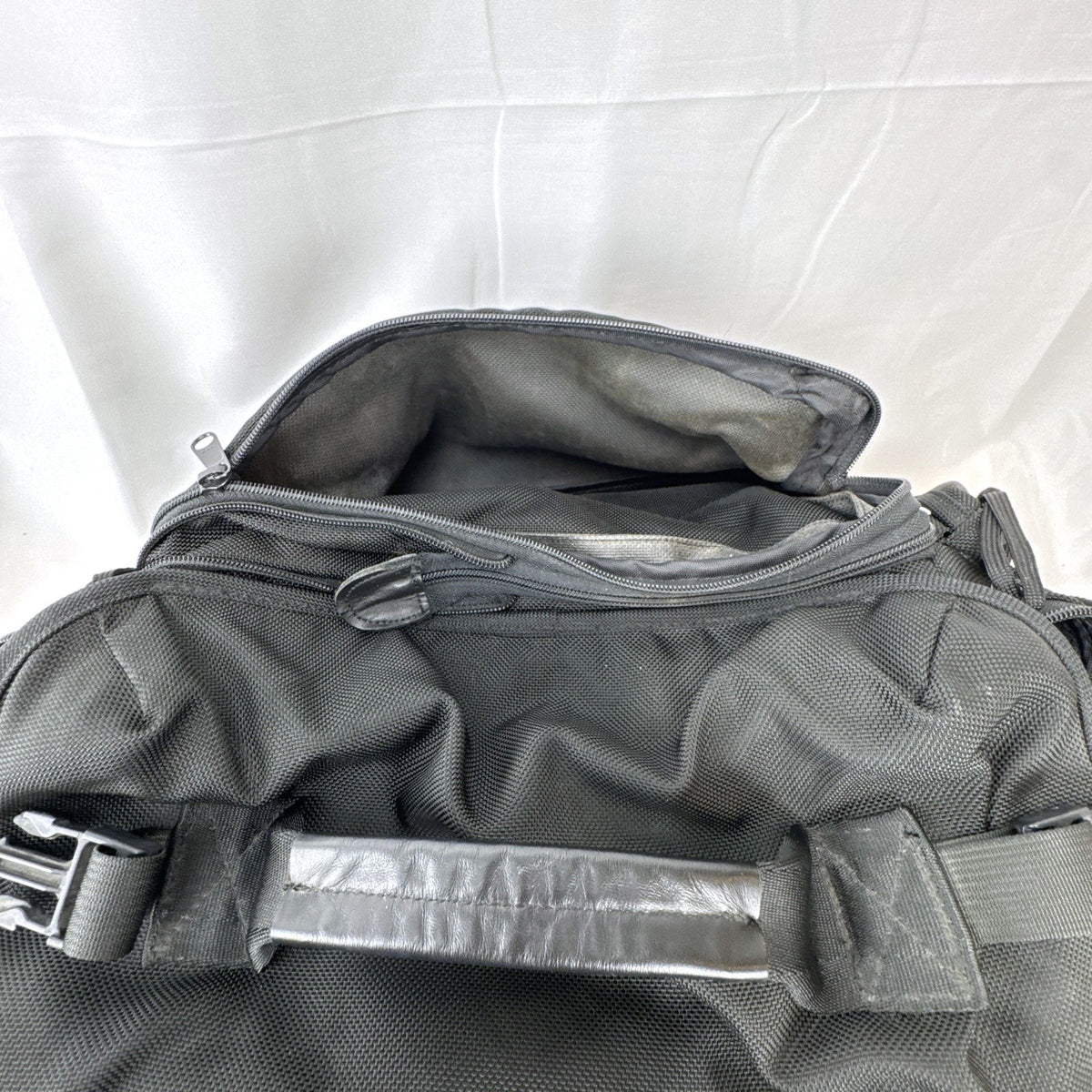 Tamrac black ballistic nylon padded camera shoulder bag with red accent stripe