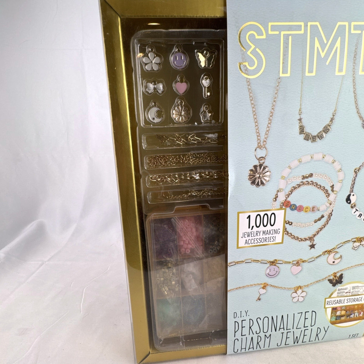 STMT personalized charm jewelry making kit by Horizon Group USA in original box with 1000+ pieces and storage case