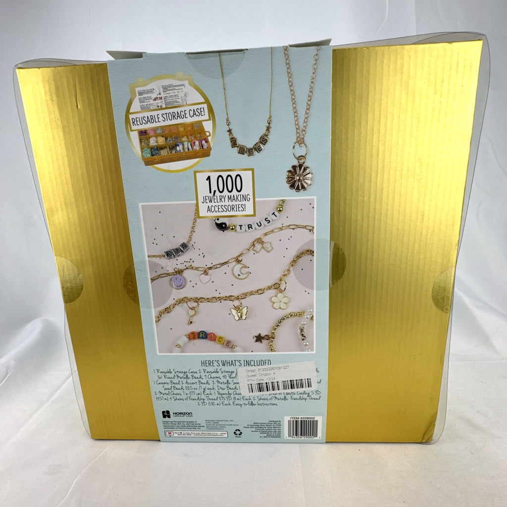 STMT D.I.Y. personalized charm jewelry making kit by Horizon Group USA with 1,000 pieces in factory sealed gold box