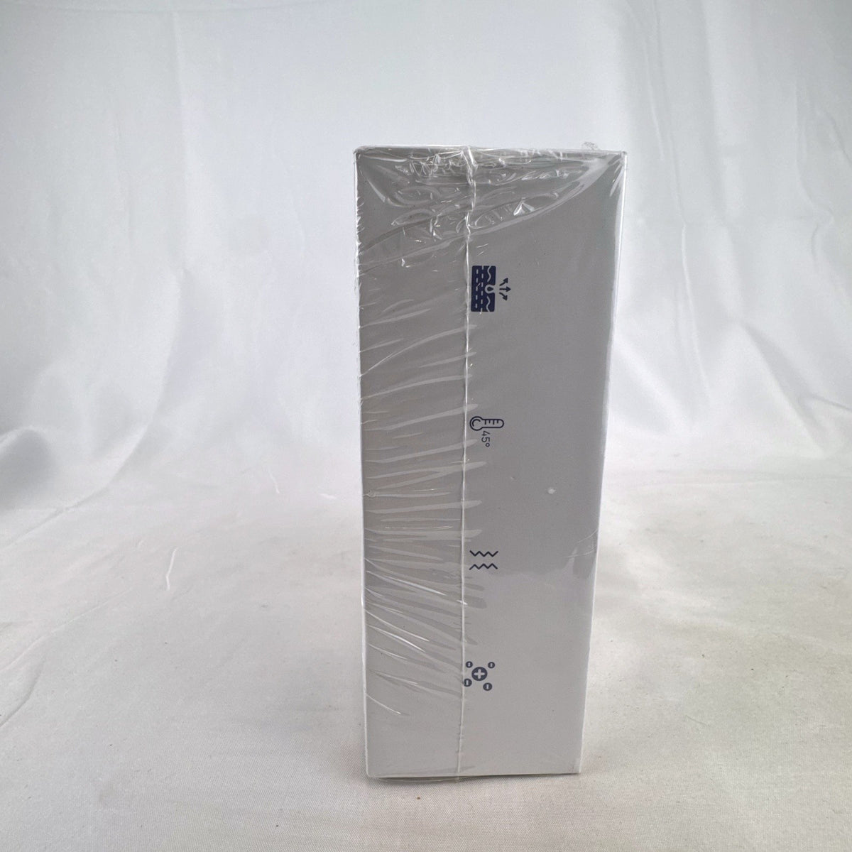 Gilukiyu ES-1081 cordless thermal face and neck massager in white with chrome accents