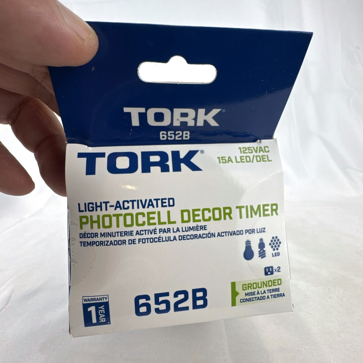 Tork 652B black outdoor plug-in photocell timer switch in original retail packaging