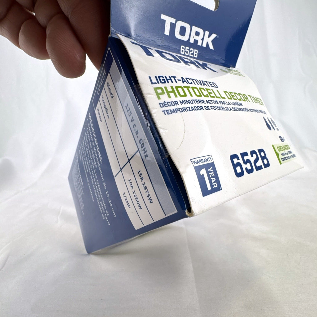 Tork 652B black outdoor plug-in photocell timer switch in original retail packaging