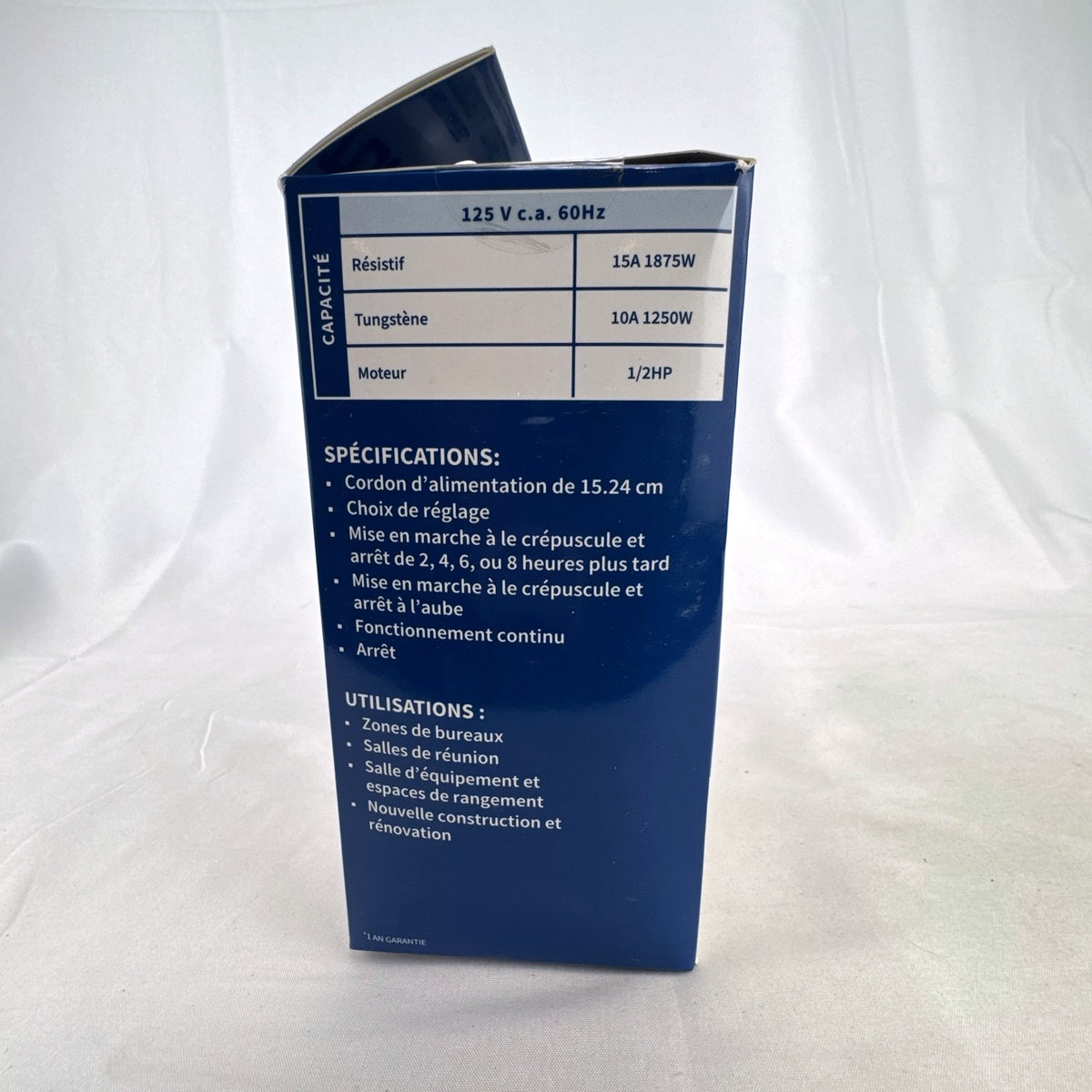 TORK 652B black outdoor photocell light timer with dual grounded outlets in its original packaging.