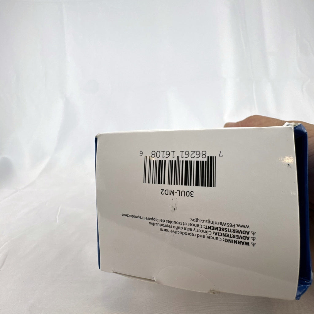 TORK 652B black outdoor photocell light timer with dual grounded outlets in its original packaging.